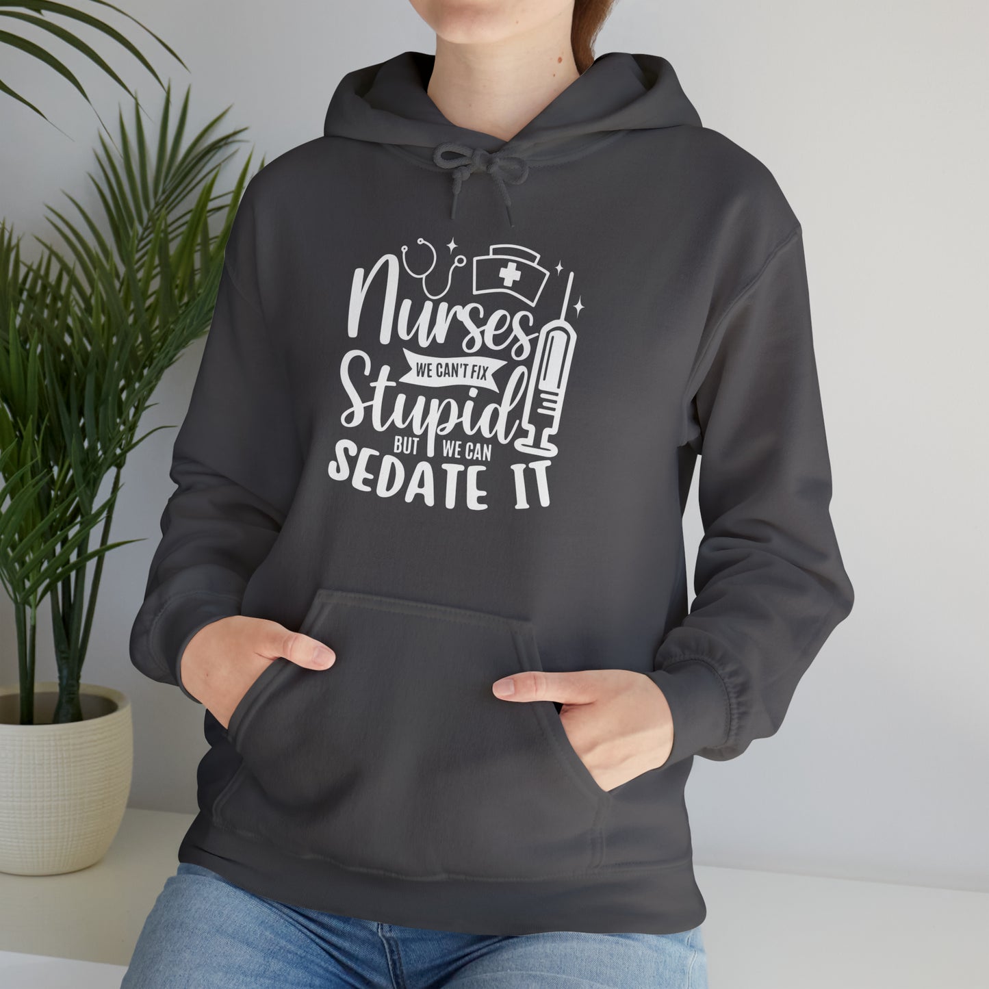 Nurse We Cant Fix Stupid But We Can Sedate It Unisex Heavy Blend™ Hooded Sweatshirt