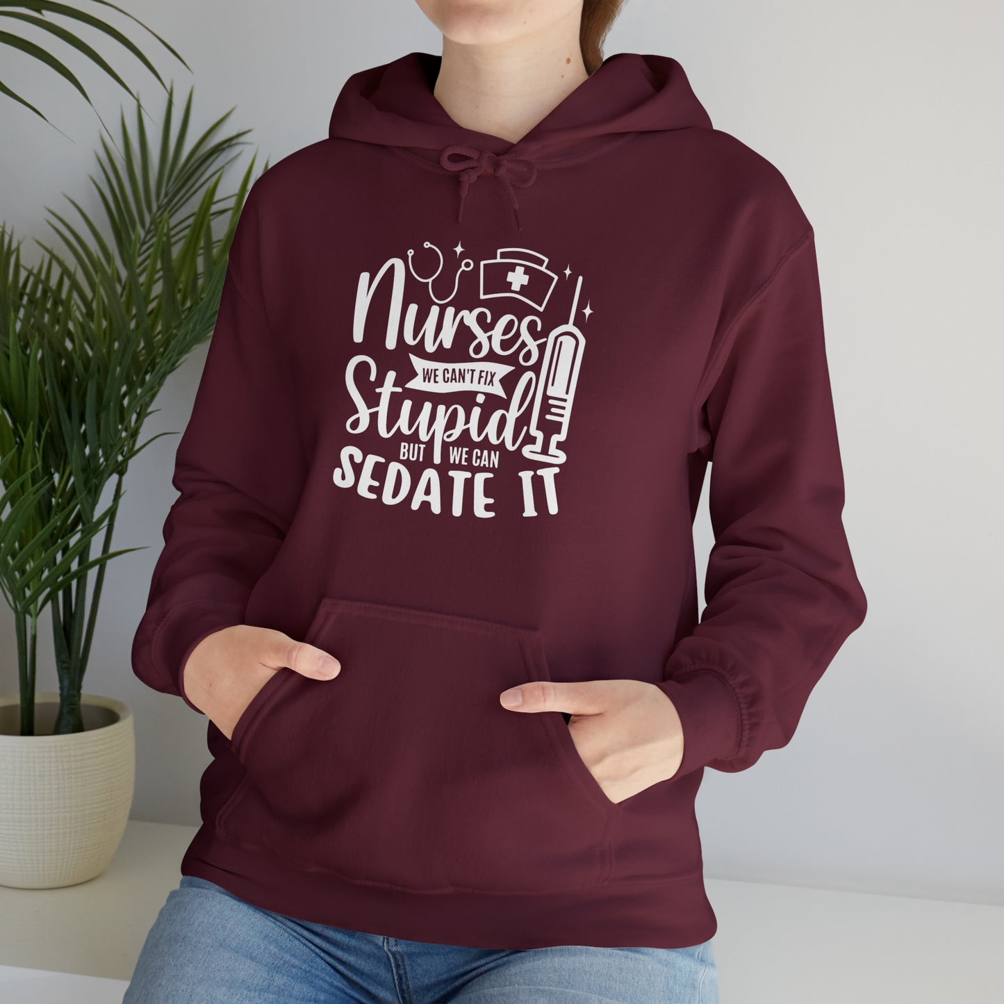 Nurse We Cant Fix Stupid But We Can Sedate It Unisex Heavy Blend™ Hooded Sweatshirt
