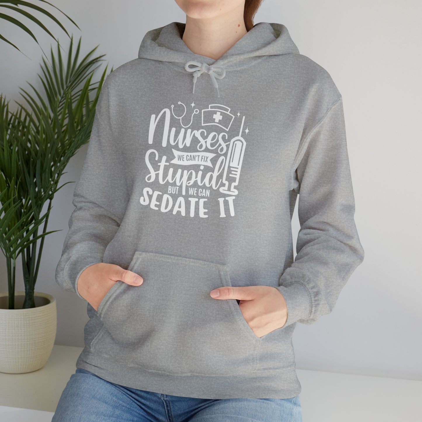 Nurse We Cant Fix Stupid But We Can Sedate It Unisex Heavy Blend™ Hooded Sweatshirt